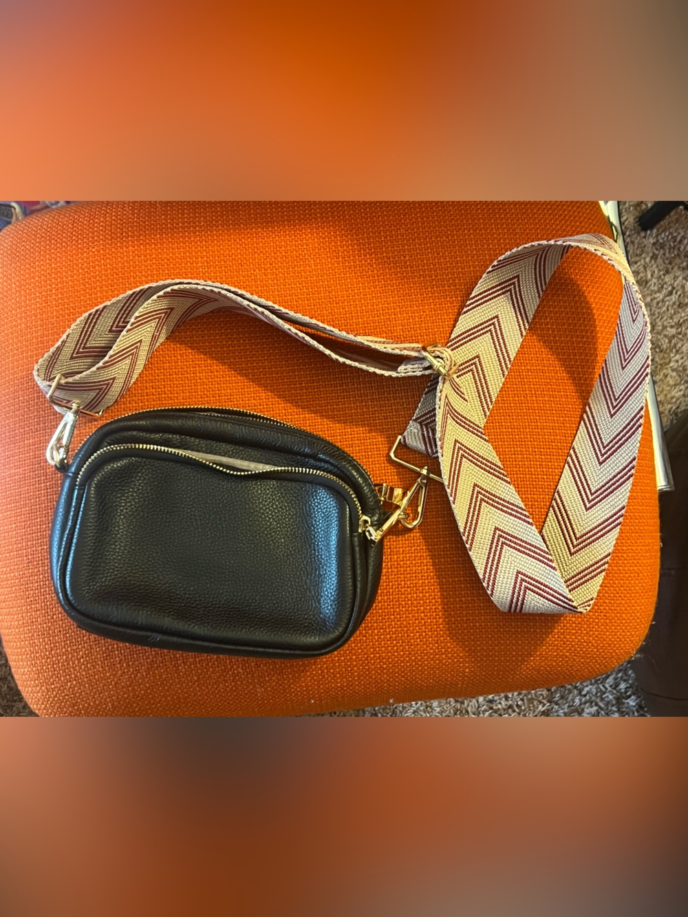 Pom Pom Black Pebbled Crossbody Camera Bag with Chevron Webbed Strap